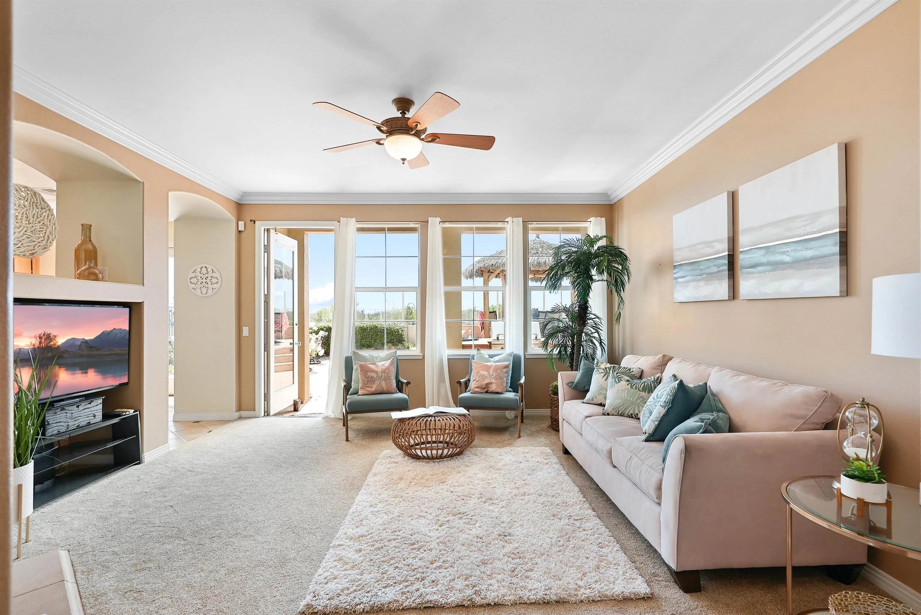 7539 Reeve Road Carlsbad, CA 92011 - Photo 6 of 30 a living room with furniture and a flat screen tv