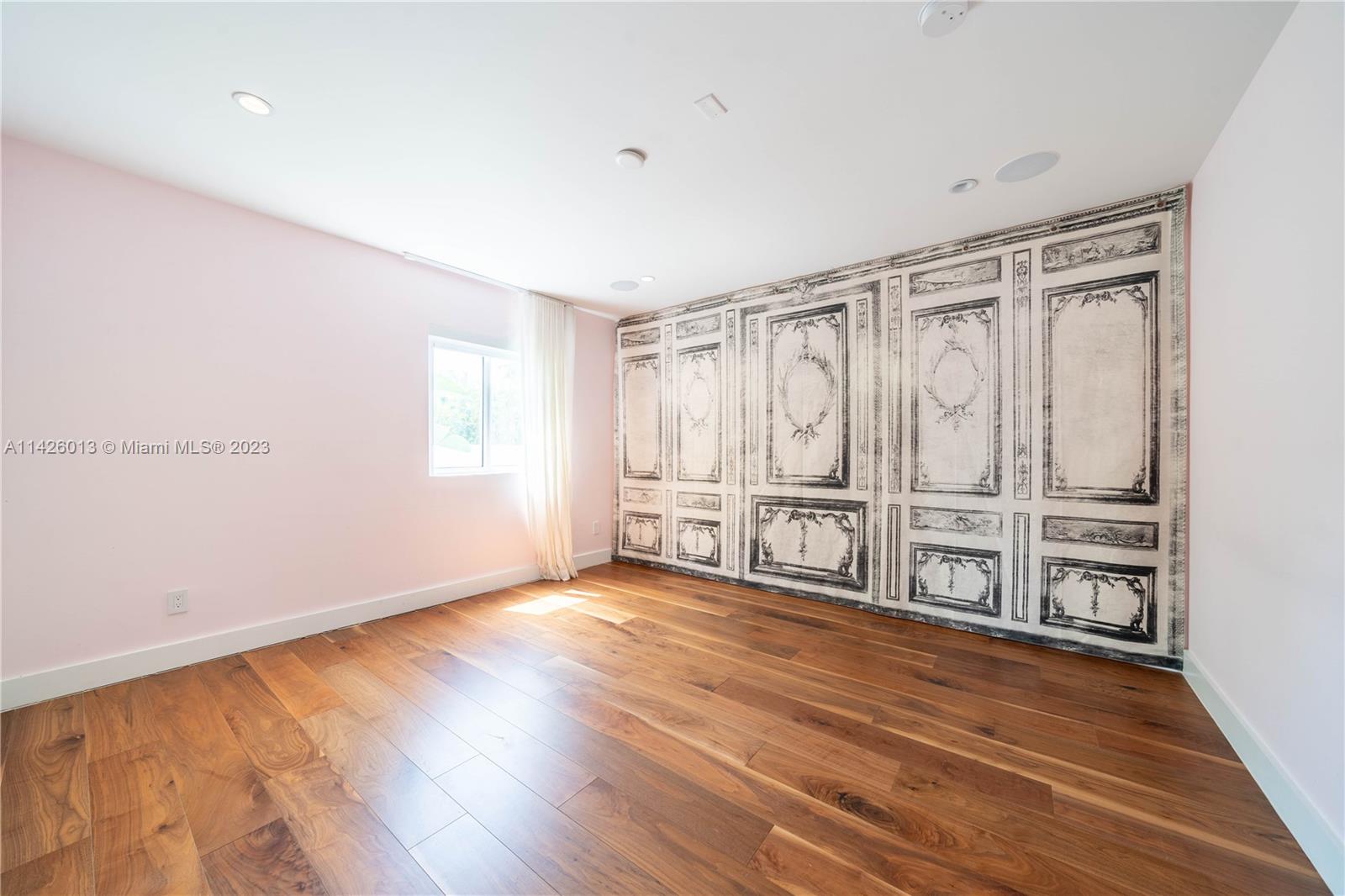 Palm Island Miami Beach, FL 33139 - Photo 35 of 50 a view of an empty room with wooden floor