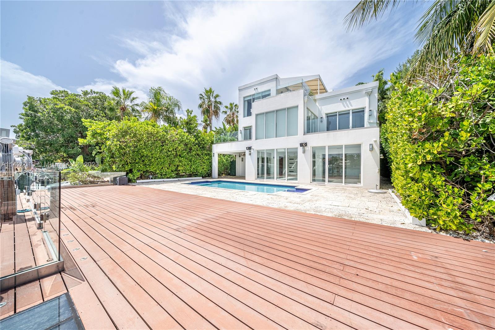 Palm Island Miami Beach, FL 33139 - Photo 46 of 50 a front view of a house with a yard