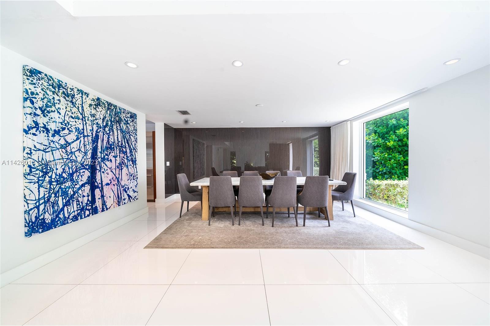 Palm Island Miami Beach, FL 33139 - Photo 8 of 50 a view of a dining room with furniture window and outside view
