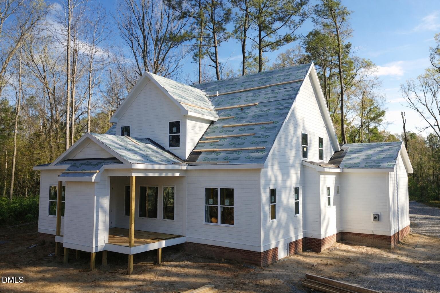 a front view of a house with a porch
