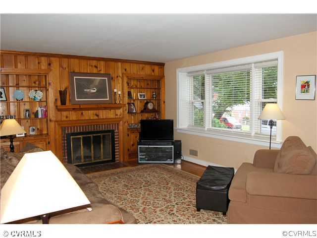 2804 Kenmore Road Henrico, VA 23228 - Photo 4 of 21 Living Room - Living room with fireplace and panel