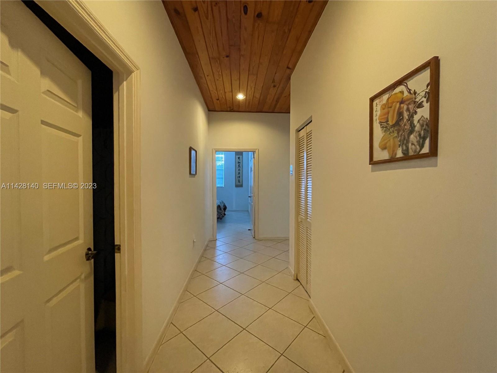 33300 Southwest 202nd Avenue Homestead, FL 33030 - Photo 13 of 42 a view of a hallway