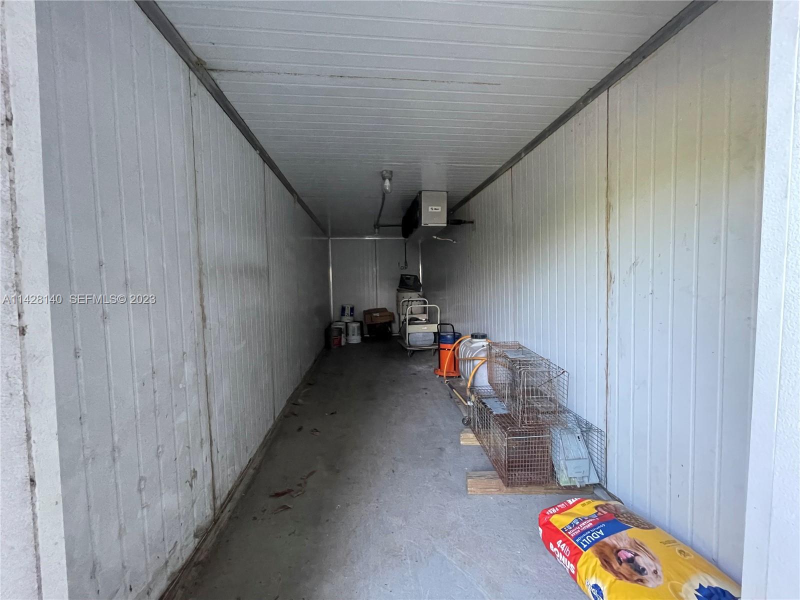 33300 Southwest 202nd Avenue Homestead, FL 33030 - Photo 28 of 42 a room with storage and utility