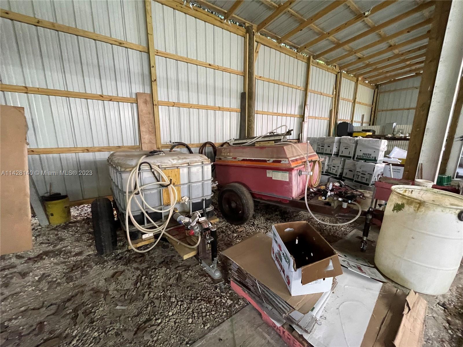 33300 Southwest 202nd Avenue Homestead, FL 33034 - Photo 38 of 42 a storage room with furniture