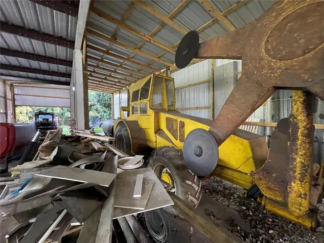 a view of a car park in the back