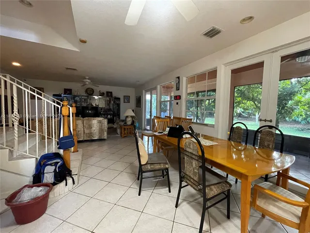 a view of a hallway with windows