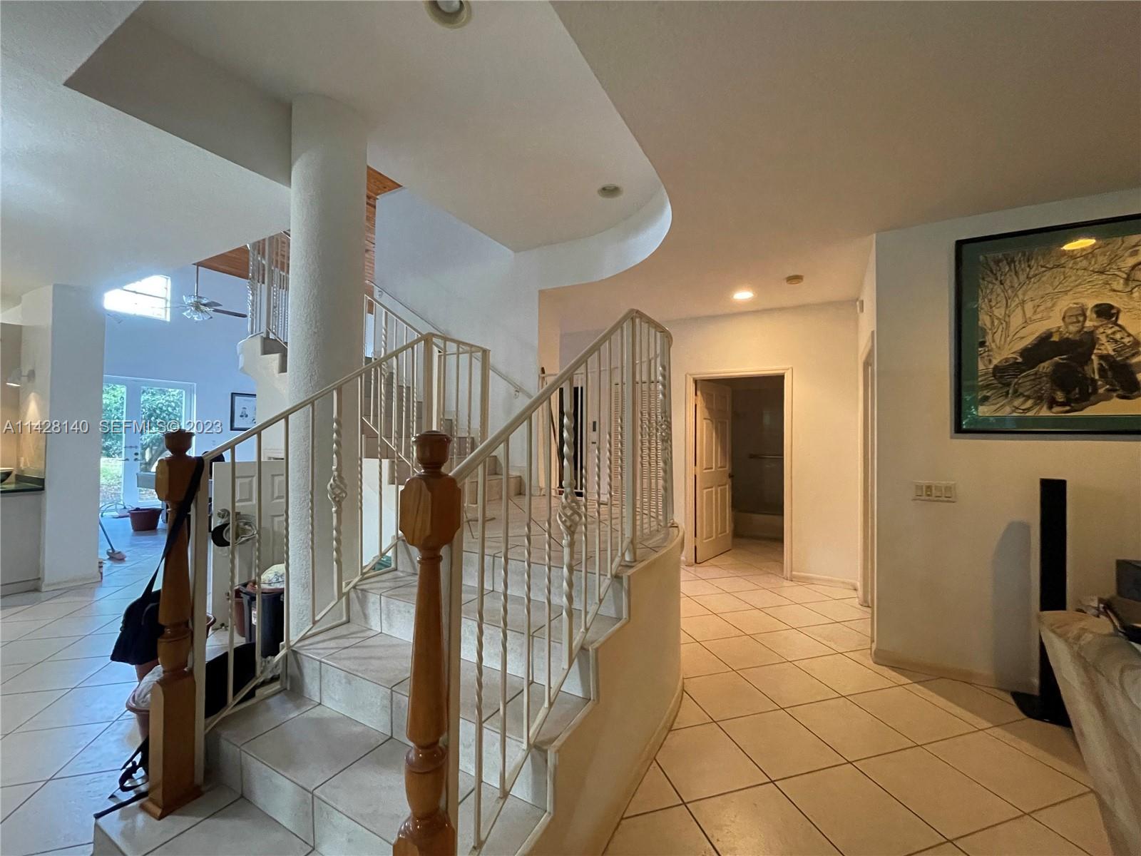 33300 Southwest 202nd Avenue Homestead, FL 33030 - Photo 8 of 42 a view of a hallway with windows