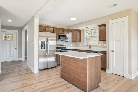 a view of a room with racks on the wall