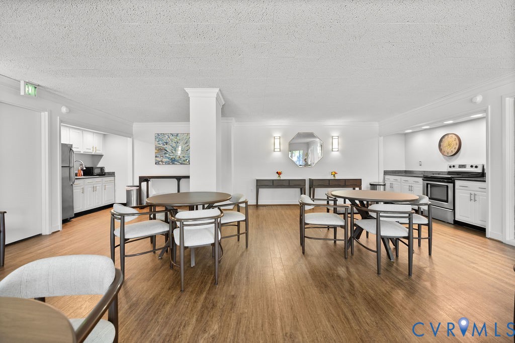 2956 Hathaway Road, Unit U704 Richmond, VA 23225 - Photo 33 of 42 Spacious common area featuring wood-finish floorin