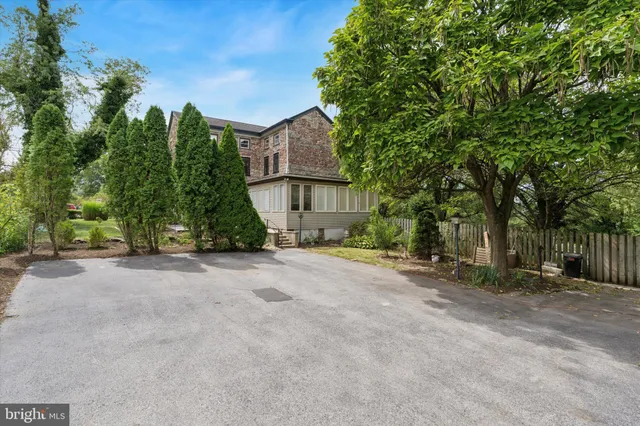 a view of a house with a street