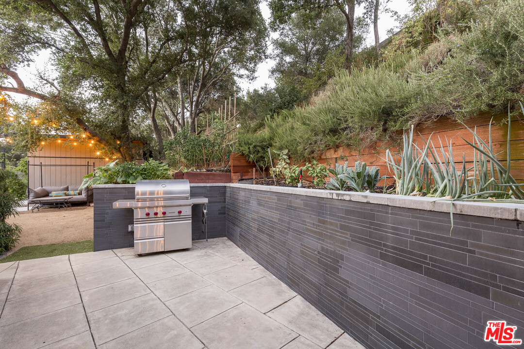 616 Cold Canyon Road Calabasas, CA 91302 - Photo 37 of 51 a view of house with outdoor space