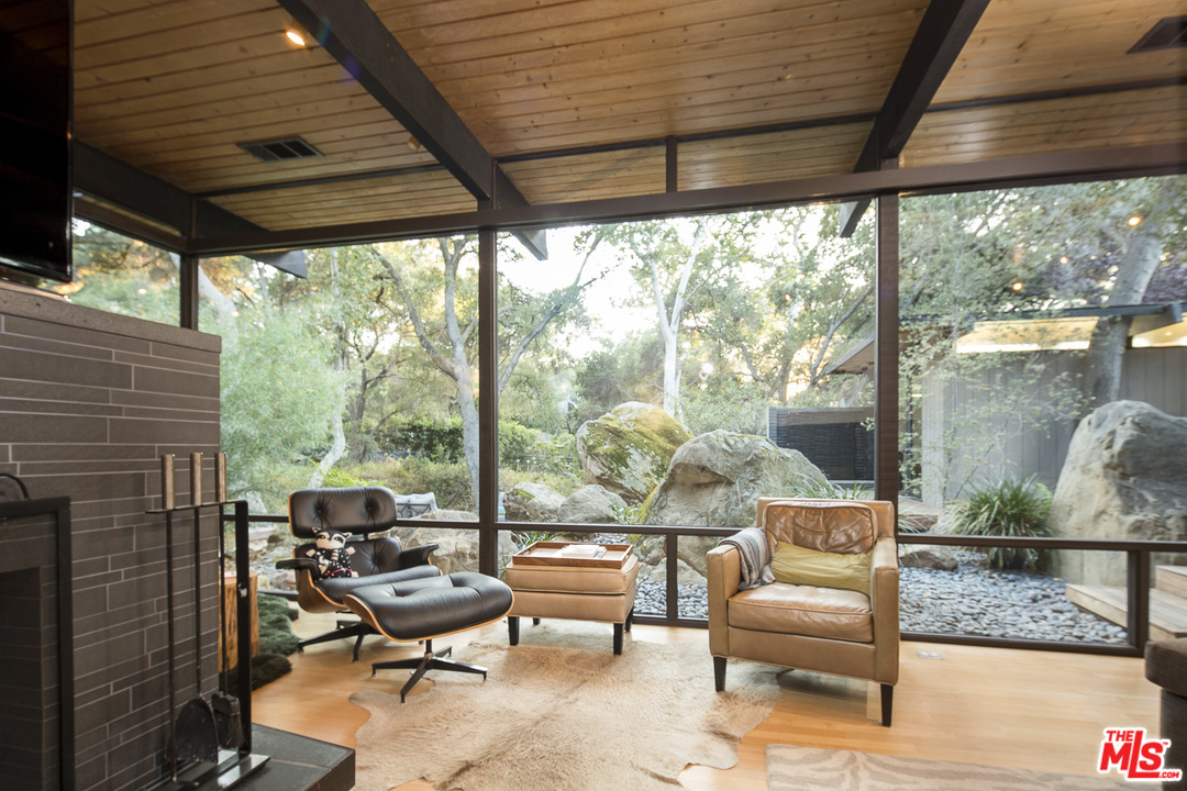 616 Cold Canyon Road Calabasas, CA 91302 - Photo 5 of 51 a balcony with chairs and outdoor view