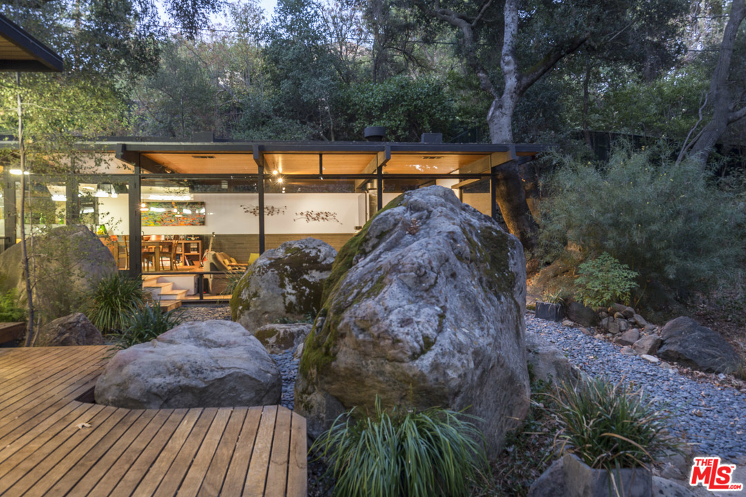 616 Cold Canyon Road Calabasas, CA 91302 - Photo 45 of 51 a view of swimming pool with a yard