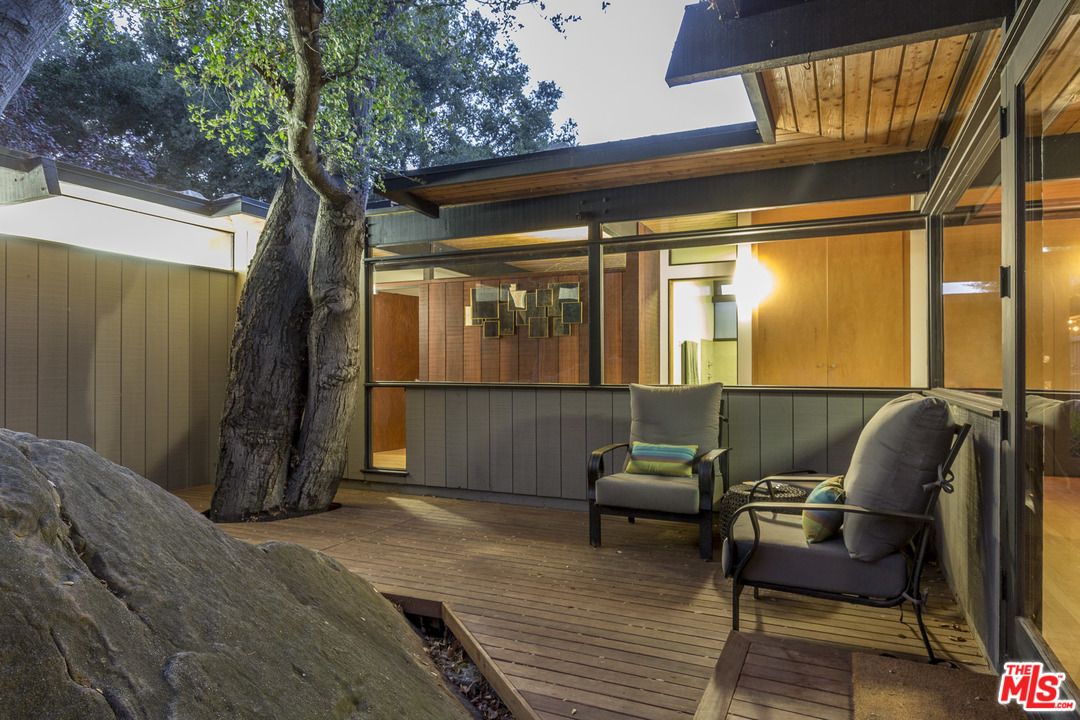 616 Cold Canyon Road Calabasas, CA 91302 - Photo 48 of 51 a view of two chairs in the patio