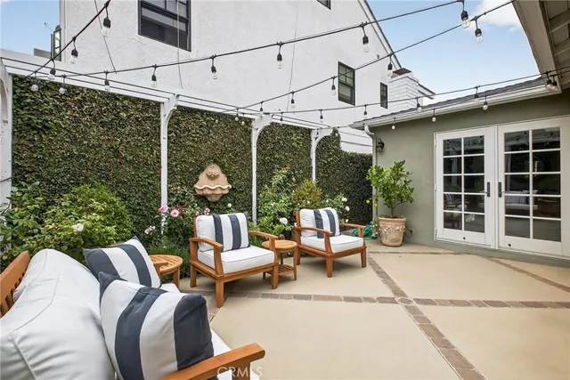 a outdoor living space with furniture and garden view