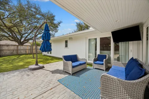 a building outdoor space with patio furniture