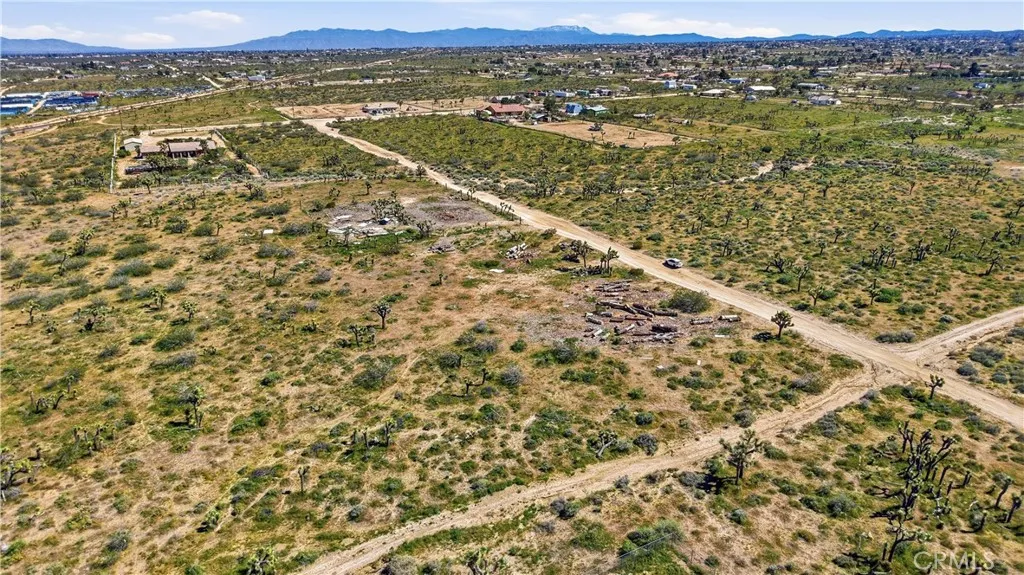 0 Sunset Road Phelan, CA 92371 - Photo 14 of 34 an aerial view of residential houses with outdoor space