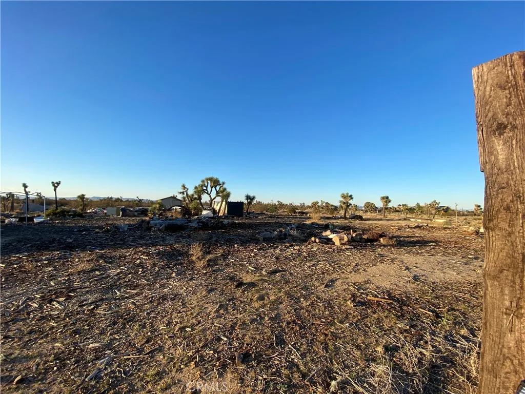 0 Sunset Road Phelan, CA 92371 - Photo 32 of 34 a view of a lake in front of a building