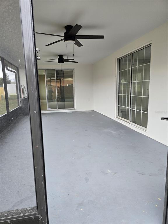 5813 Chapman Drive New Port Richey, FL 34652 - Photo 28 of 33 an empty room with windows