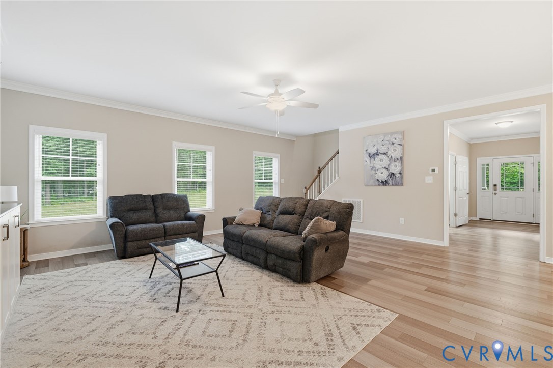 7598 Rural Point Road Mechanicsville, VA 23116 - Photo 8 of 41 a living room with furniture and a window