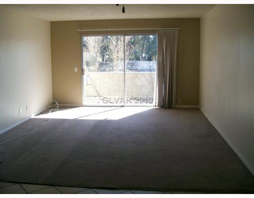 1765 Jupiter Court, Unit B Las Vegas, NV 89119 - Photo 2 of 9 Living Room.