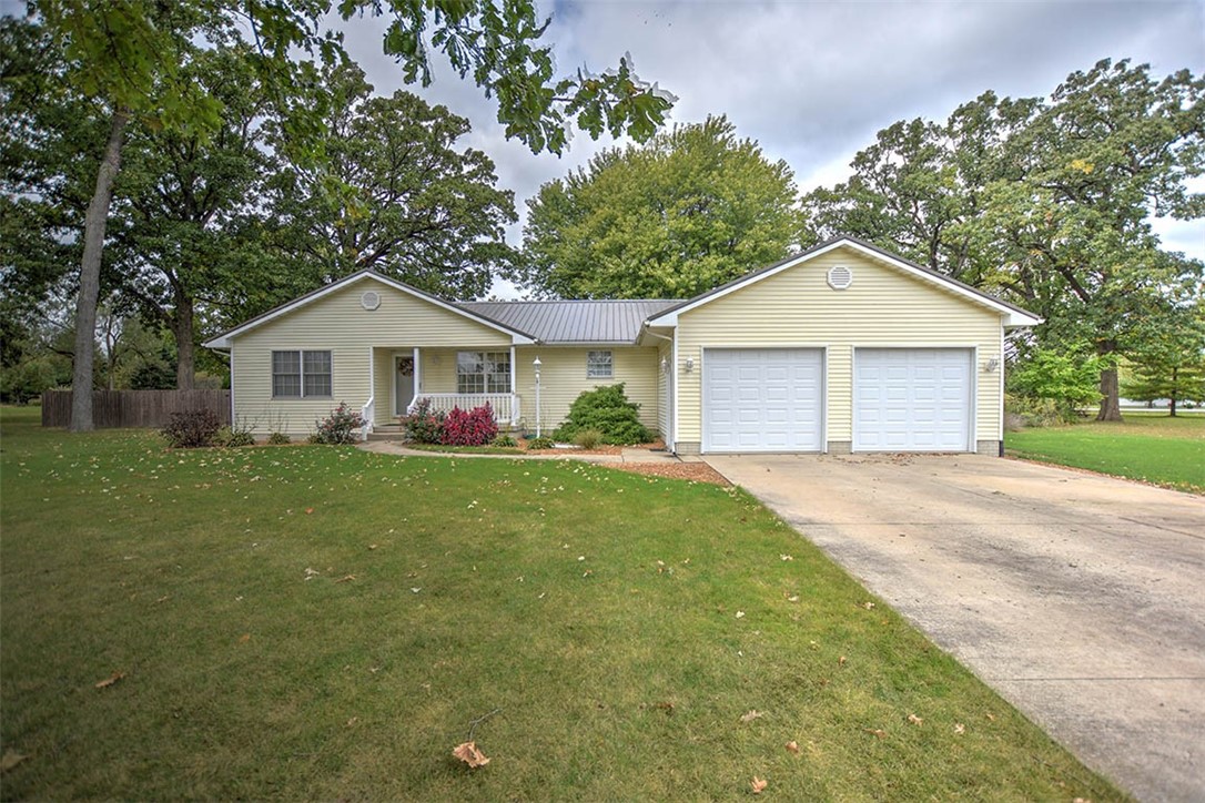 2008 St Louis Bridge Road Decatur, IL 62521 - Photo 1 of 36 a front view of a house with a garden