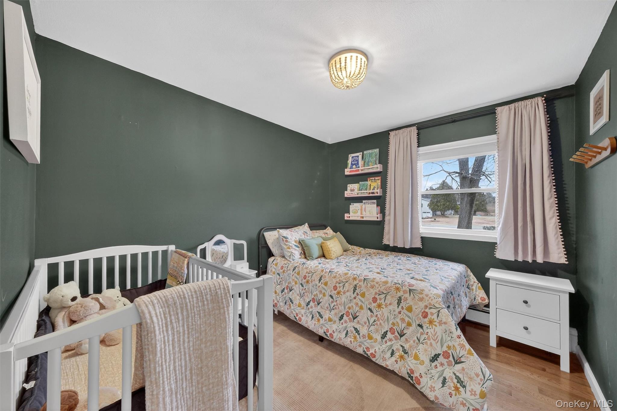 21 Russo Road Hopewell Junction, NY 12533 - Photo 18 of 41 a bedroom with two beds and a window