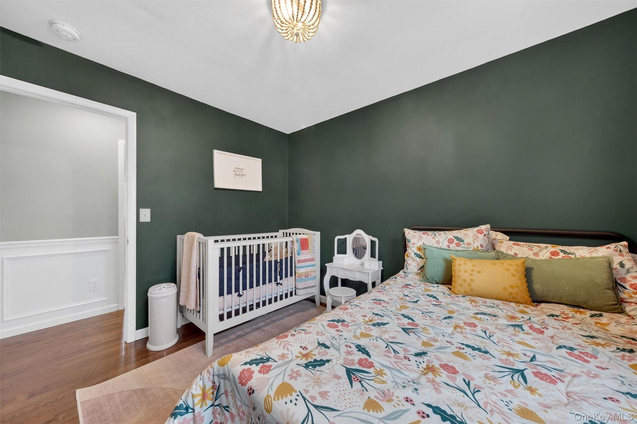 21 Russo Road Hopewell Junction, NY 12533 - Photo 19 of 41 a bedroom with a bed and wooden floor