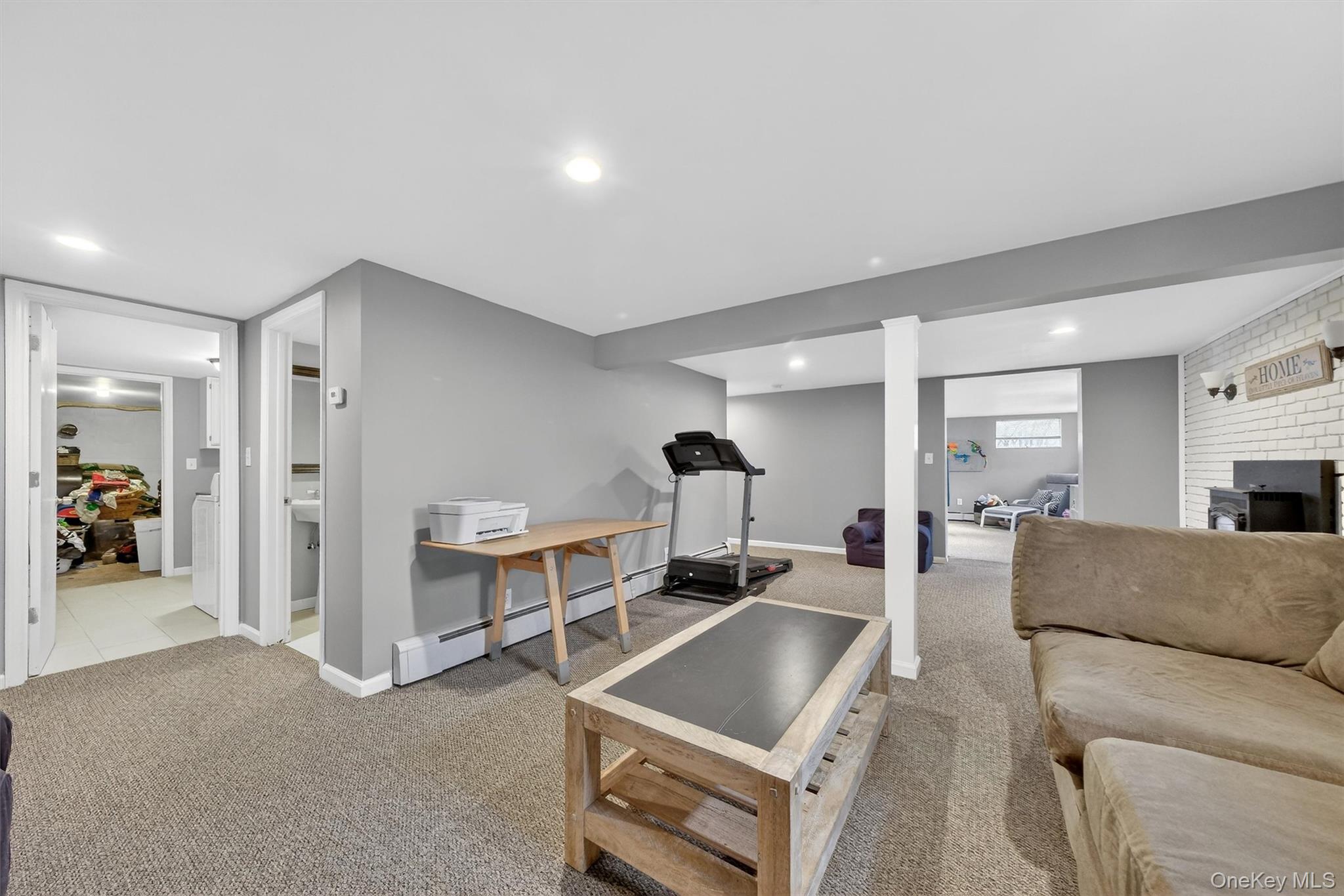 21 Russo Road Hopewell Junction, NY 12533 - Photo 27 of 41 a living room with furniture a couch and a table