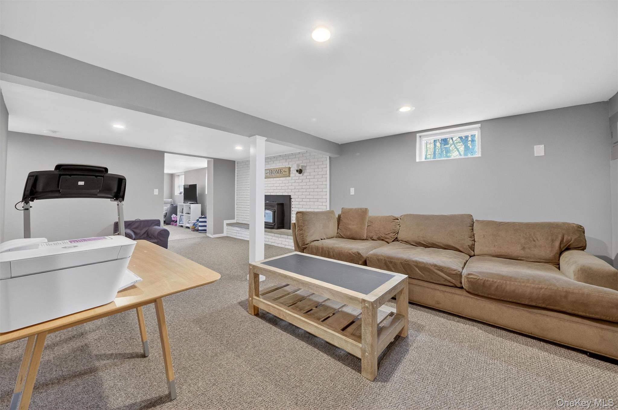 21 Russo Road Hopewell Junction, NY 12533 - Photo 28 of 41 a living room with furniture and a couch