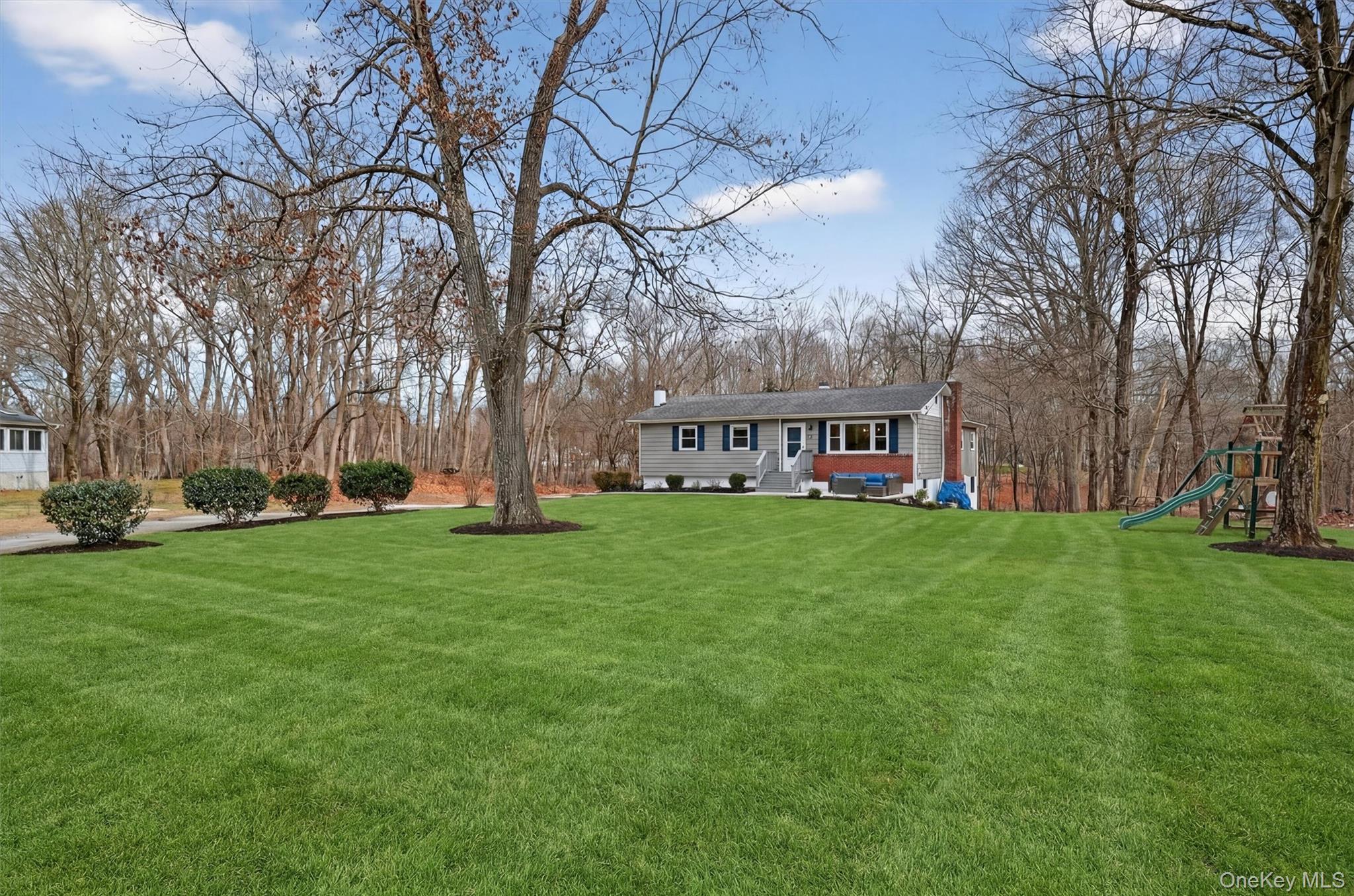 21 Russo Road Hopewell Junction, NY 12533 - Photo 33 of 41 a view of a house with a big yard