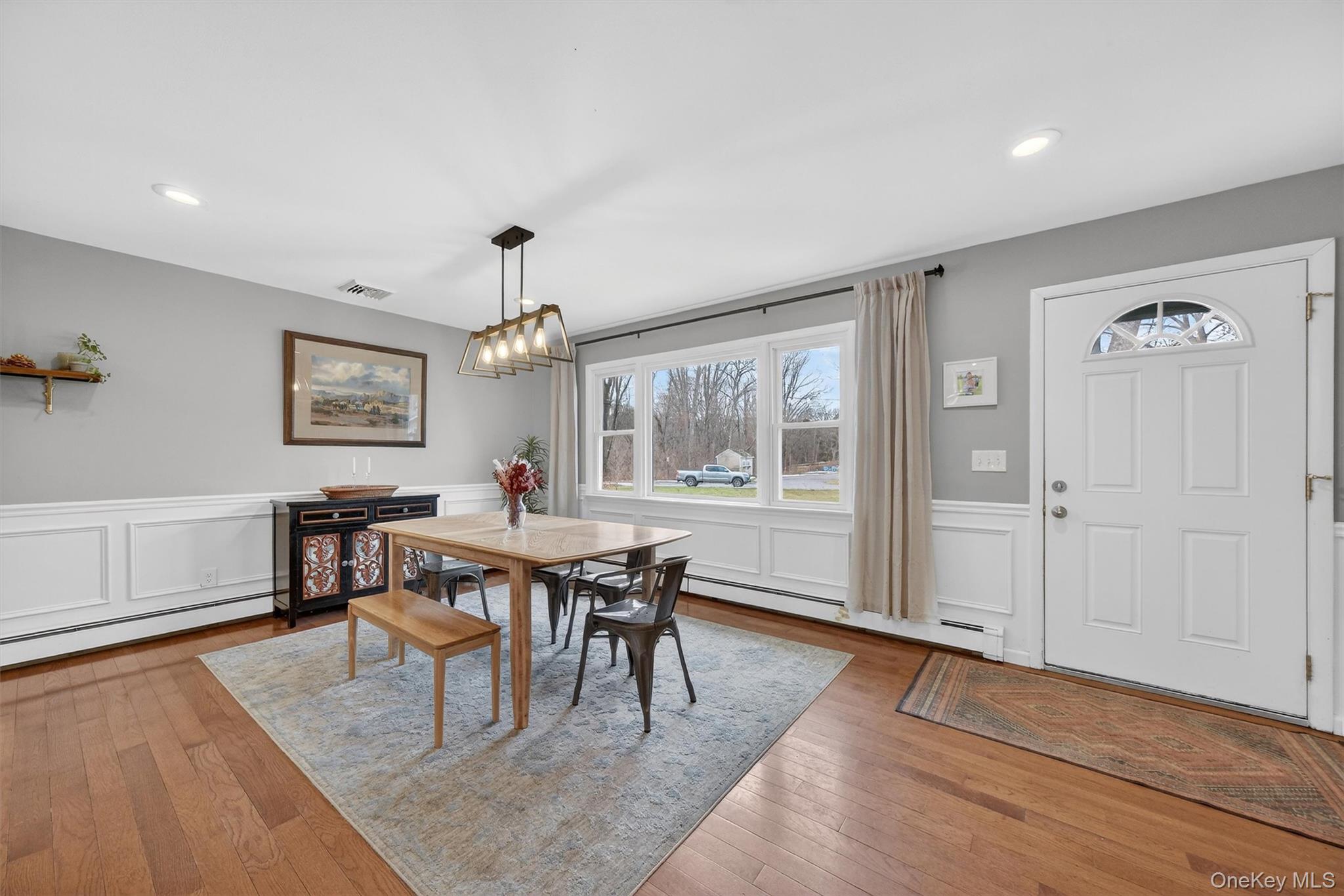 21 Russo Road Hopewell Junction, NY 12533 - Photo 3 of 41 a view of a dining room with furniture window and wooden floor