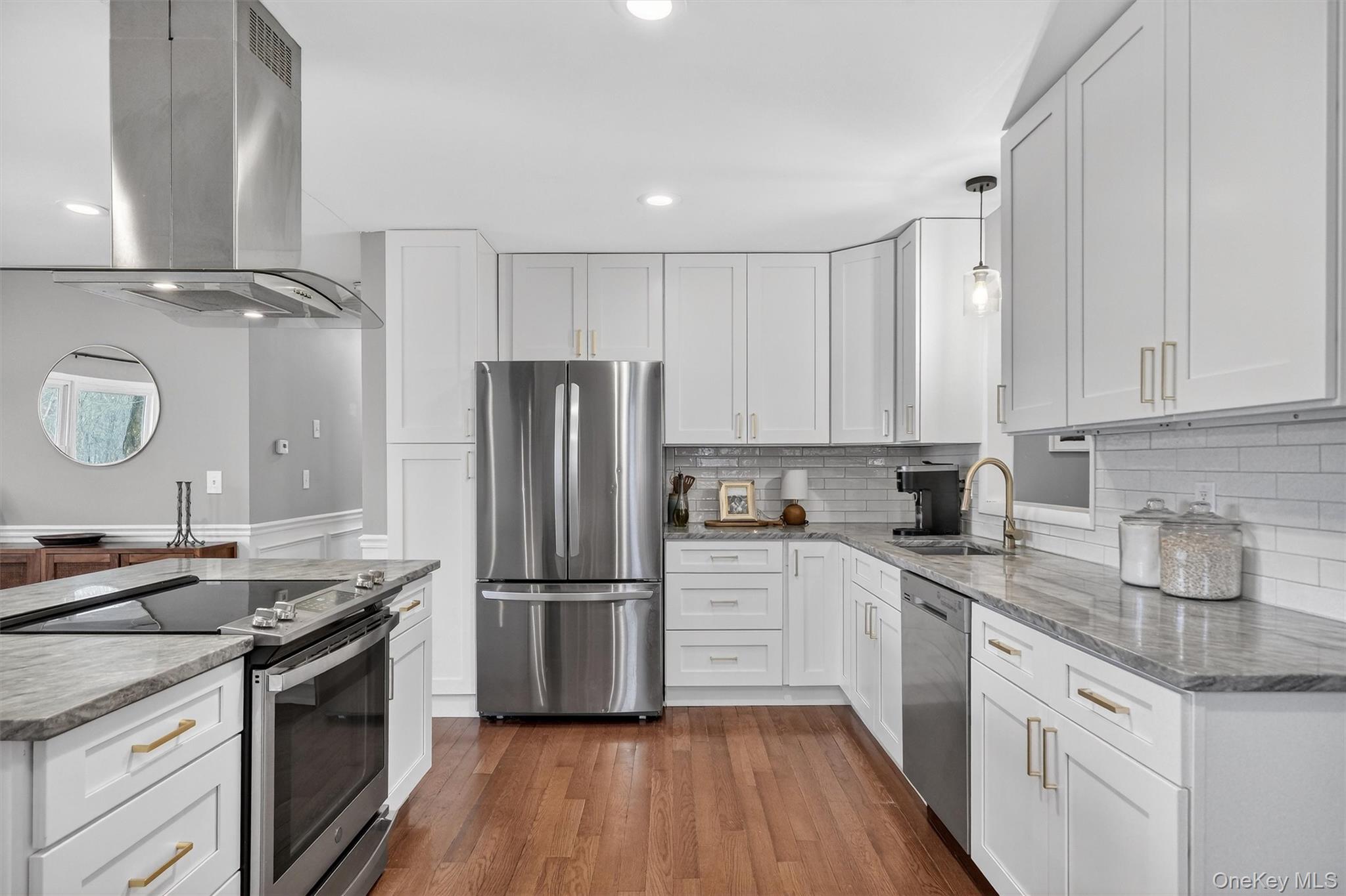 21 Russo Road Hopewell Junction, NY 12533 - Photo 8 of 41 a kitchen with a refrigerator sink and cabinets
