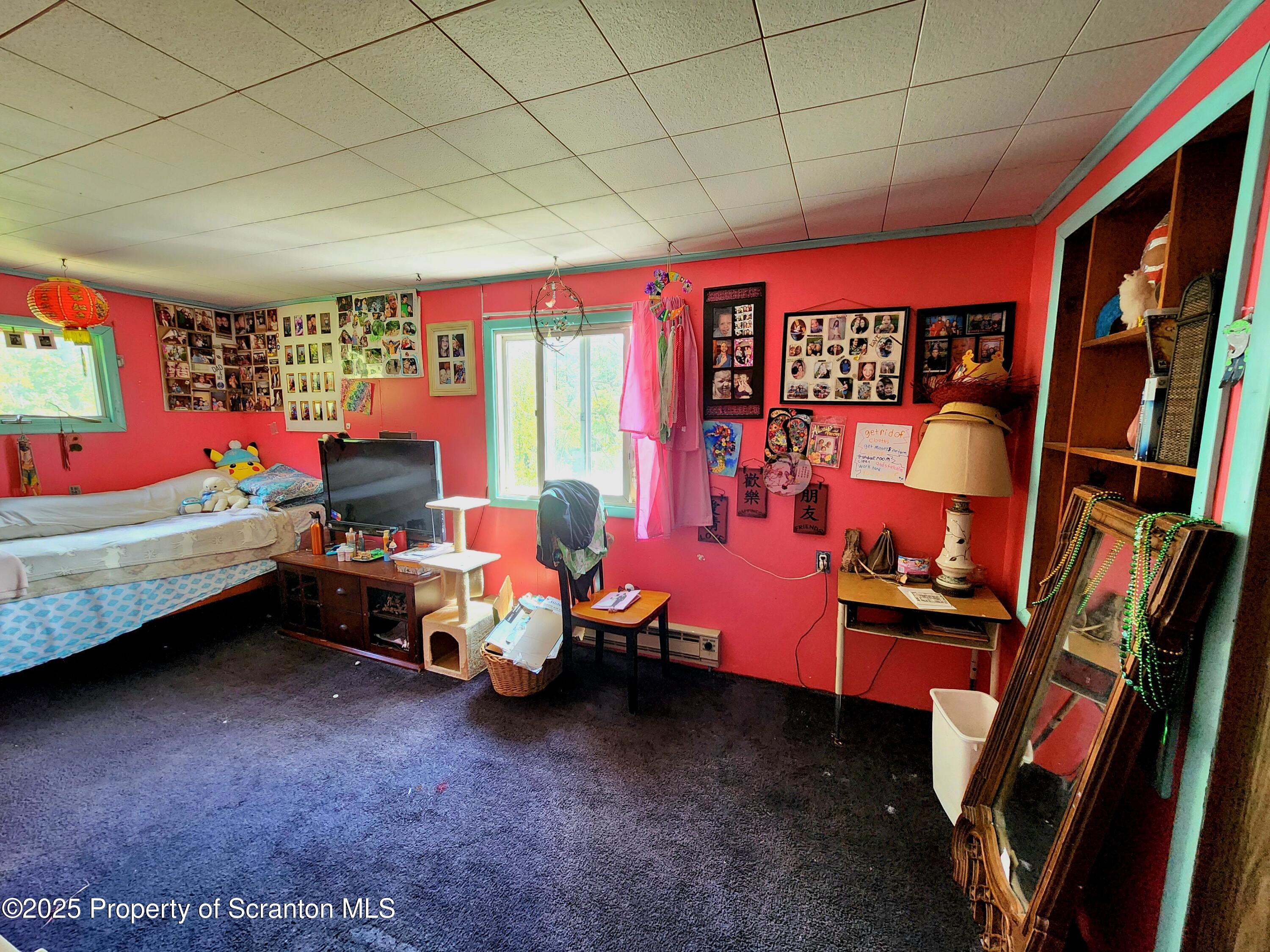 365 Carpenter Road Factoryville, PA 18419 - Photo 16 of 30 a room with furniture toys and a large window