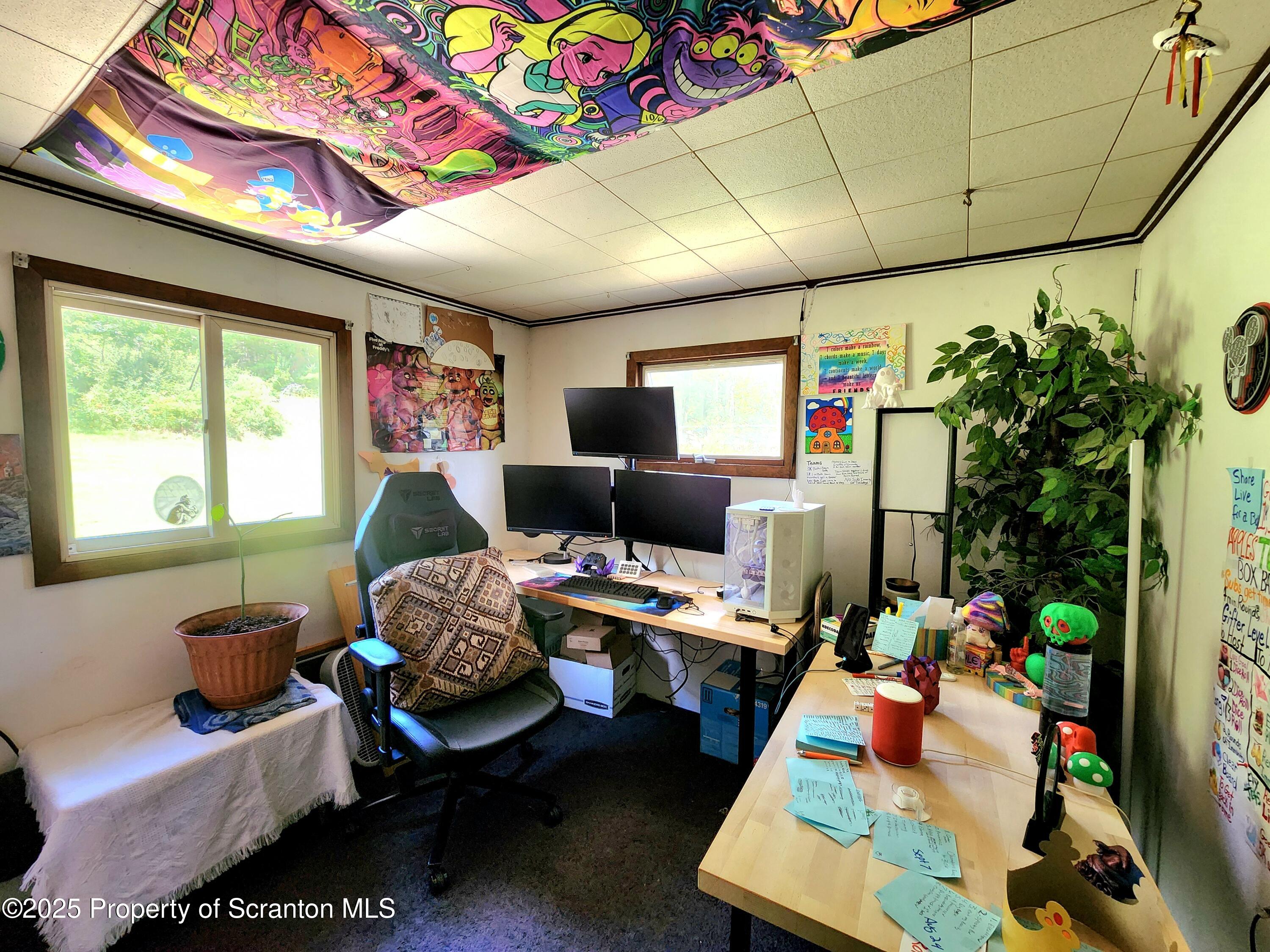 365 Carpenter Road Factoryville, PA 18419 - Photo 17 of 30 a work room with furniture and a potted plant