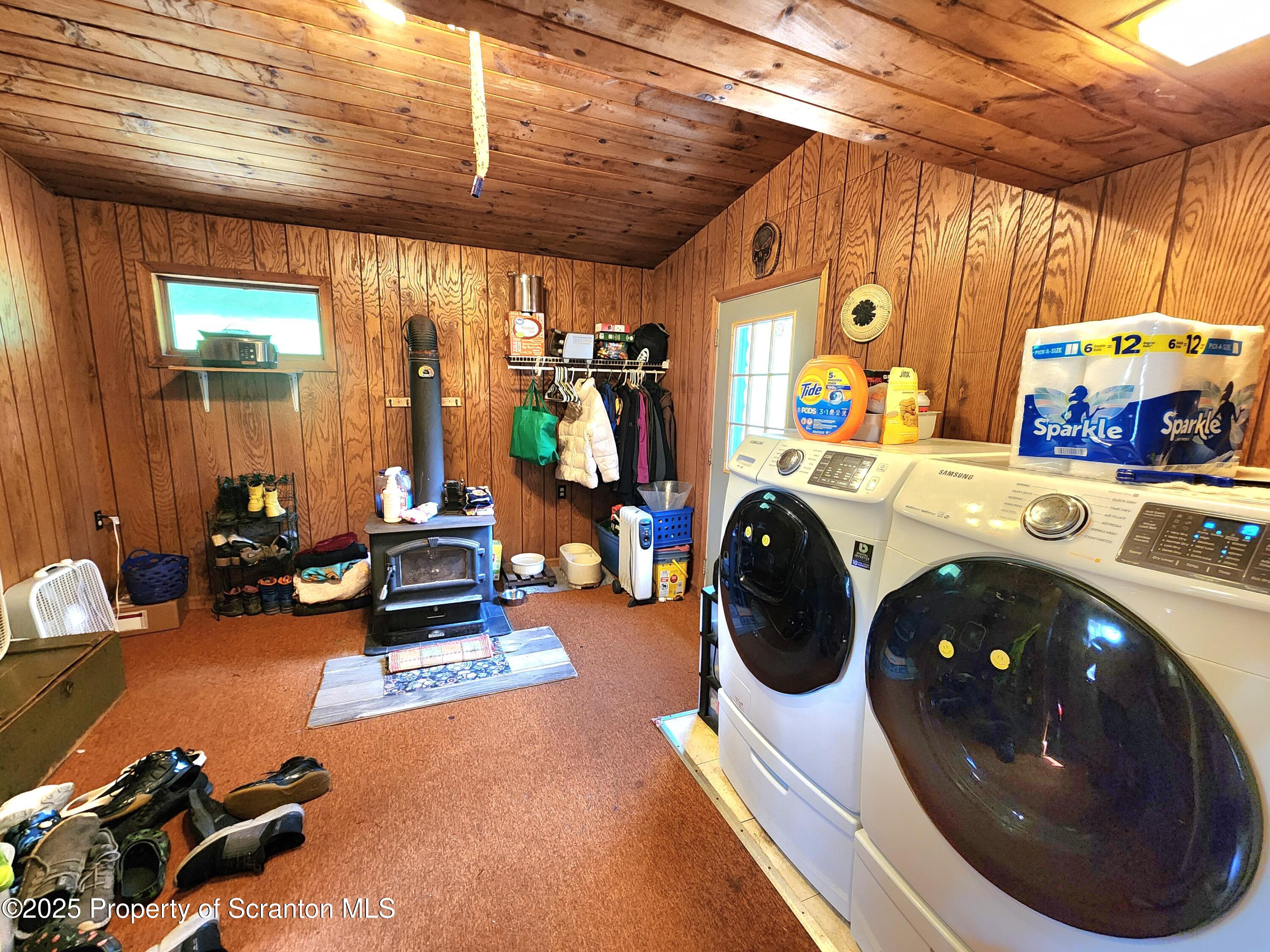 365 Carpenter Road Factoryville, PA 18419 - Photo 21 of 30 a room with furniture and a chandelier
