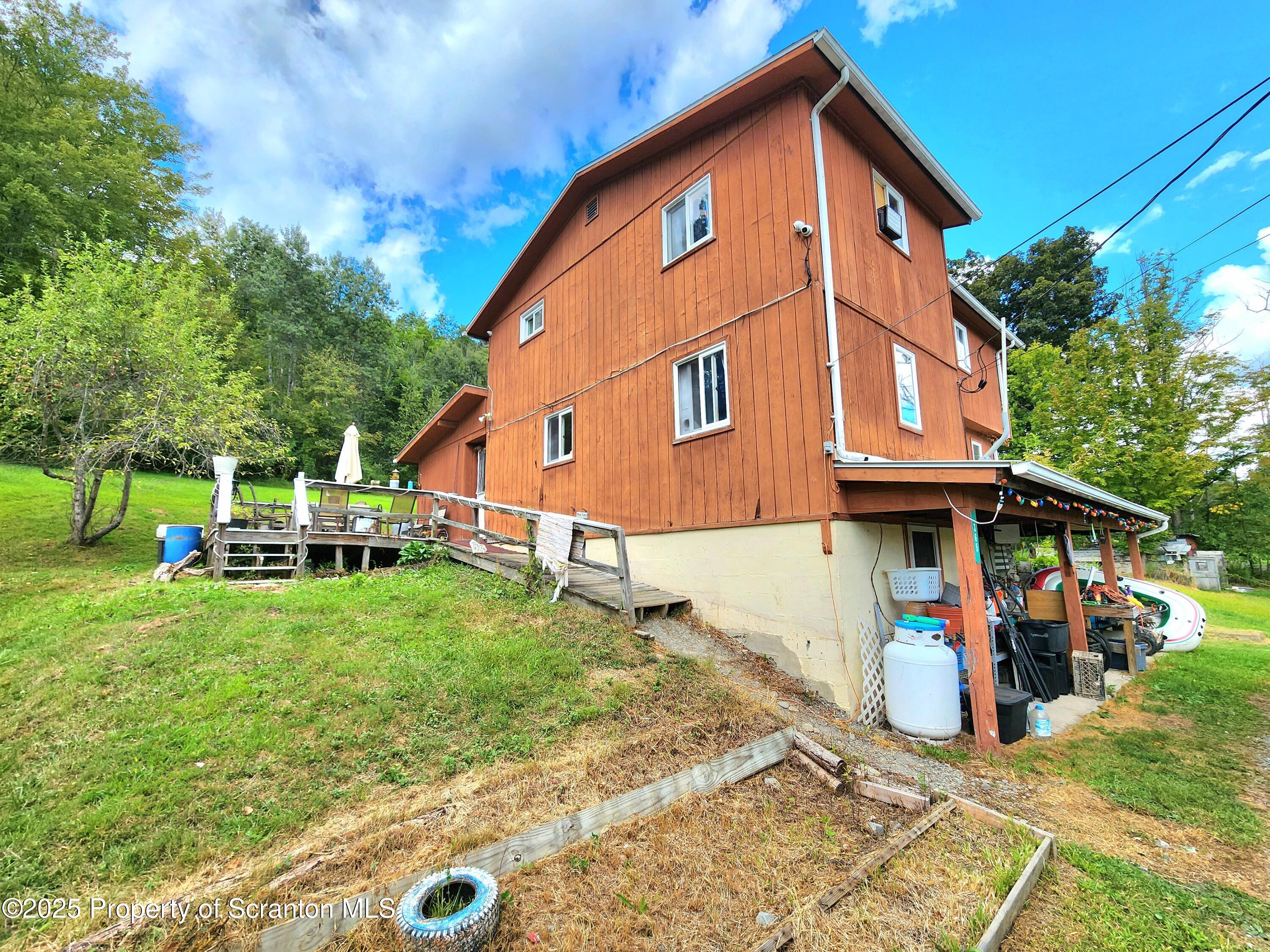 365 Carpenter Road Factoryville, PA 18419 - Photo 29 of 30 a view of a house with wooden fence