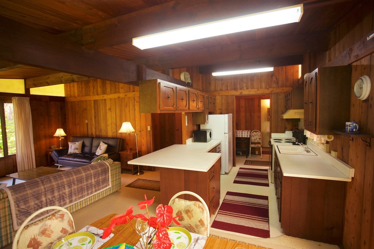 19-4096 Wright Road Volcano, HI 96785 - Photo 12 of 23 a dining room with furniture and wooden floor