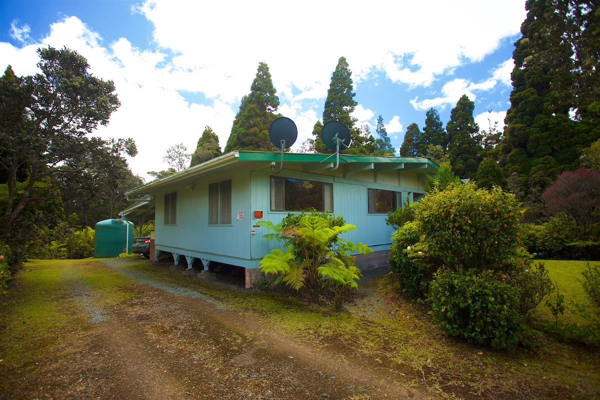 19-4096 Wright Road Volcano, HI 96785 - Photo 5 of 23 a front view of a house with garden