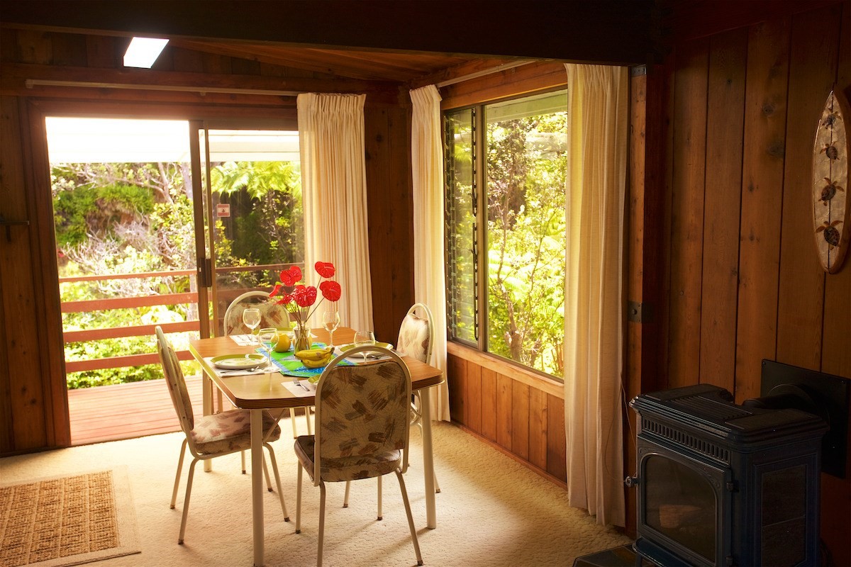 19-4096 Wright Road Volcano, HI 96785 - Photo 6 of 23 a dining room with furniture and garden view