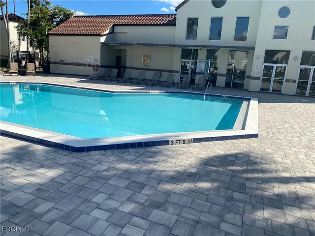 a view of a house with a swimming pool