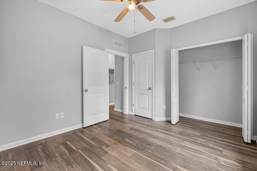 932 Puryear Street St. Augustine, FL 32084 - Photo 14 of 29 a view of a livingroom with wooden floor
