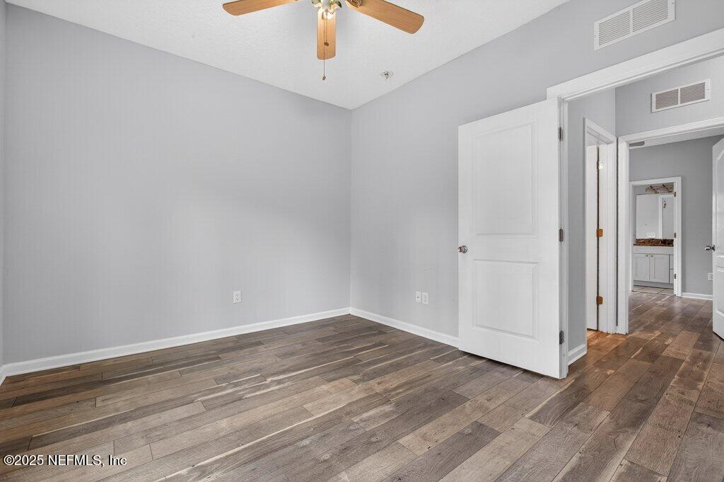 932 Puryear Street St. Augustine, FL 32084 - Photo 15 of 29 wooden floor in an empty room