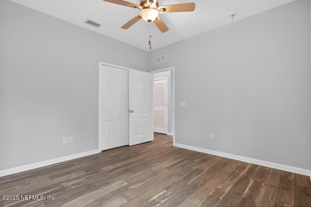 932 Puryear Street St. Augustine, FL 32084 - Photo 21 of 29 wooden floor in an empty room