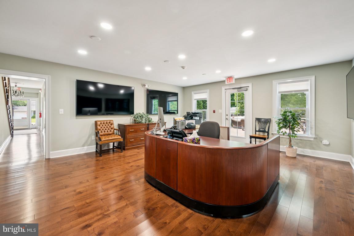 1526 Haddonfield-Berlin Road Cherry Hill, NJ 08003 - Photo 11 of 24 a living room with furniture and a flat screen tv