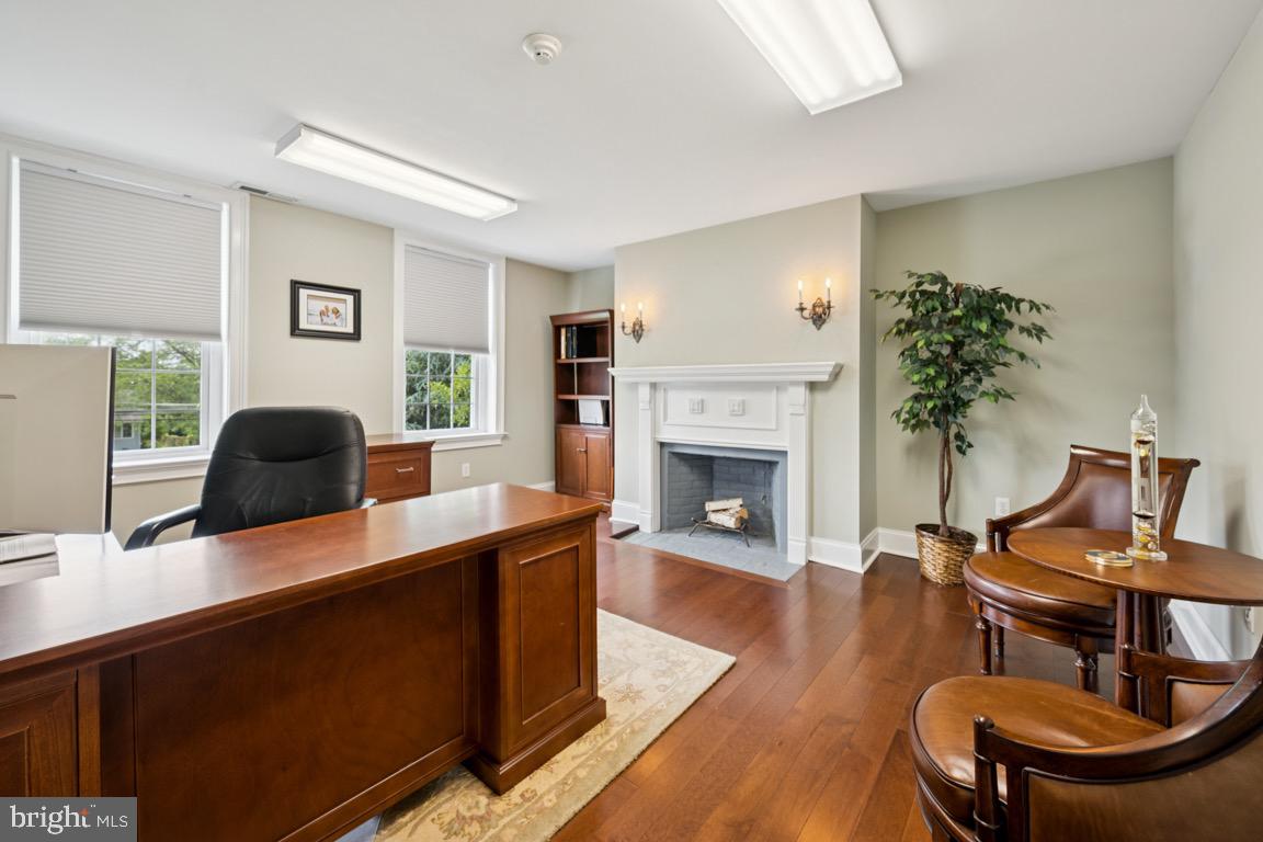1526 Haddonfield-Berlin Road Cherry Hill, NJ 08003 - Photo 20 of 24 a living room with furniture and a fireplace