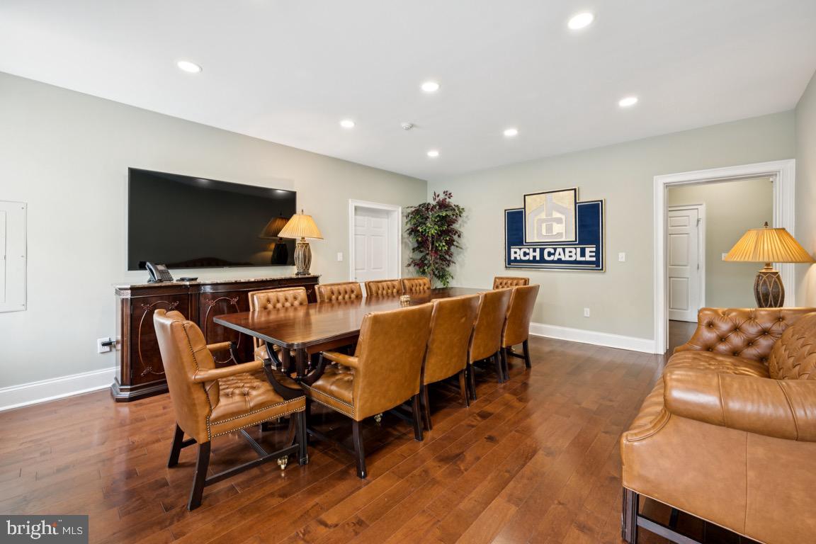 1526 Haddonfield-Berlin Road Cherry Hill, NJ 08003 - Photo 9 of 24 a living room with furniture and a flat screen tv