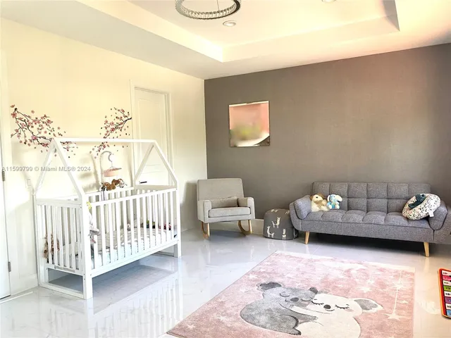 a bedroom with furniture and a couch