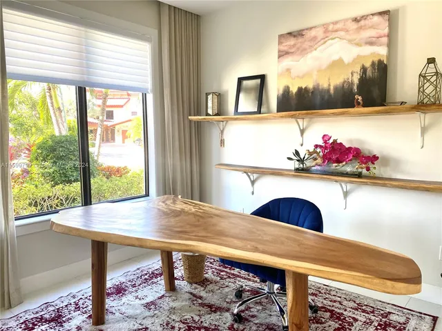 a view of a living room and a window